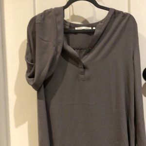 Grey long sleeved 3/4 button down blouse .